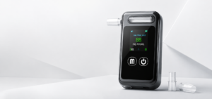 Digital breathalyzer with replaceable mouthpiece and color display