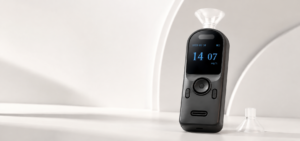Professional handheld breathalyzer with funnel mouthpiece and digital display
